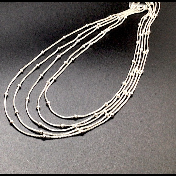 Bundle, 2 silver tone necklaces by New York. 1 spike sunburst and 1 multi strand - Picture 5 of 8